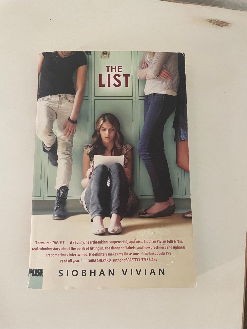 The List by Siobhan Vivian - Book with Teal Locker Cover